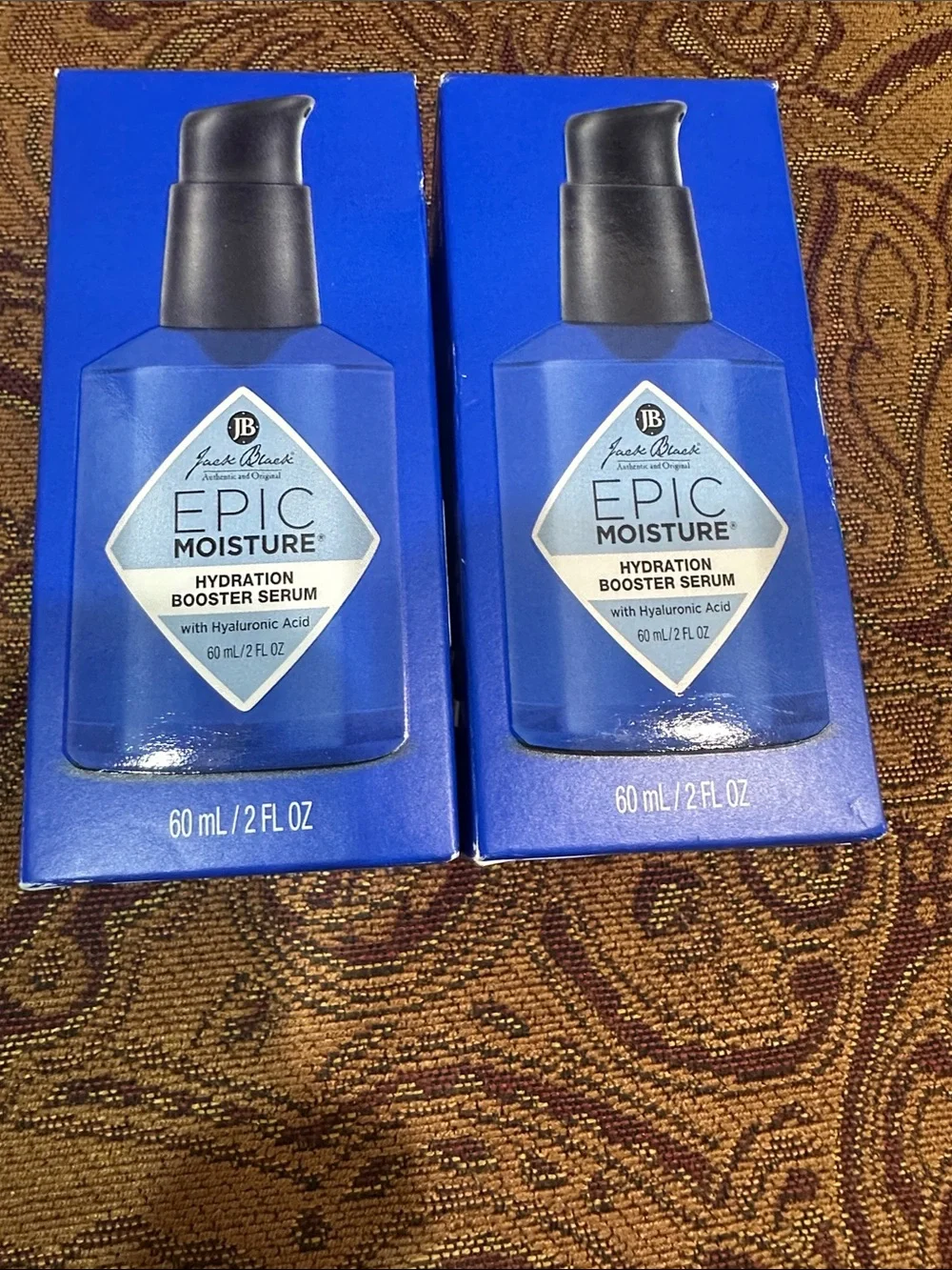 Two bottles of Jack Black Epic Moisturizer Booster Serum